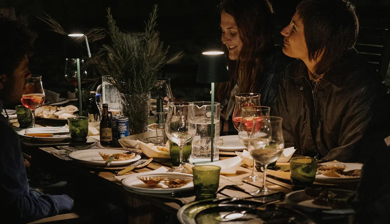 Dinner setting at Val Morosina featuring local wine pairings and fresh fish dishes — part of curated tasting experiences rooted in the lagoon